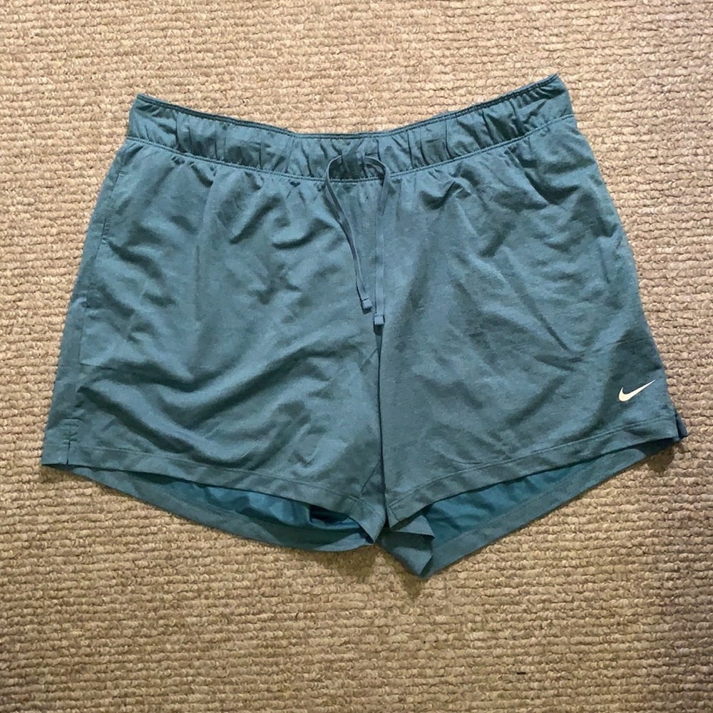 Large, light blue Nike athletic shorts